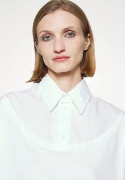 MM6 Maison Margiela Polo - White -Épure Mode Promos Boutique dc3552b4c88e43d98170e8980b794b37